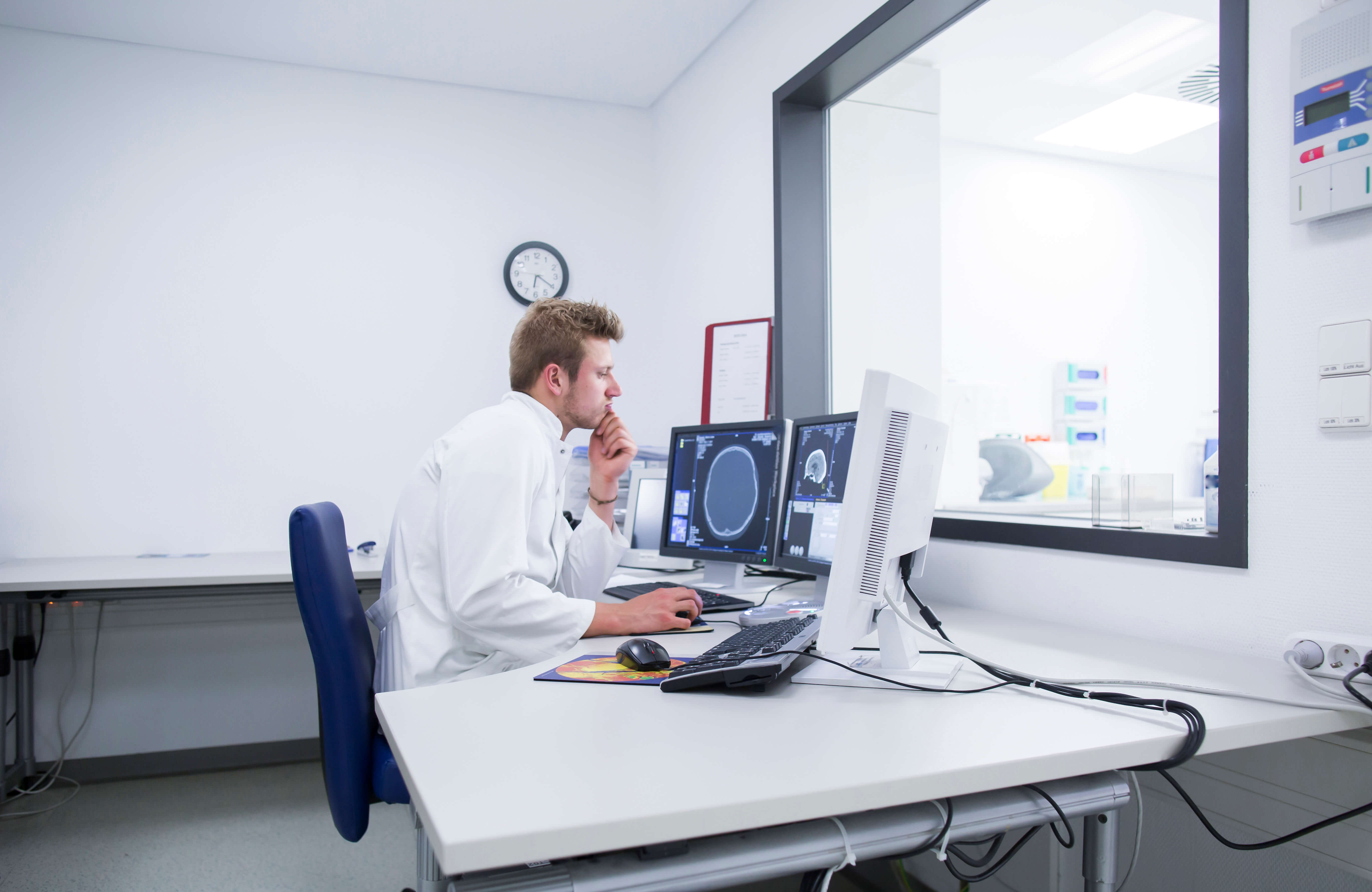 radiologist-at-a-x-ray-machine-in-a-hospital-2023-11-27-04-54-13-utc